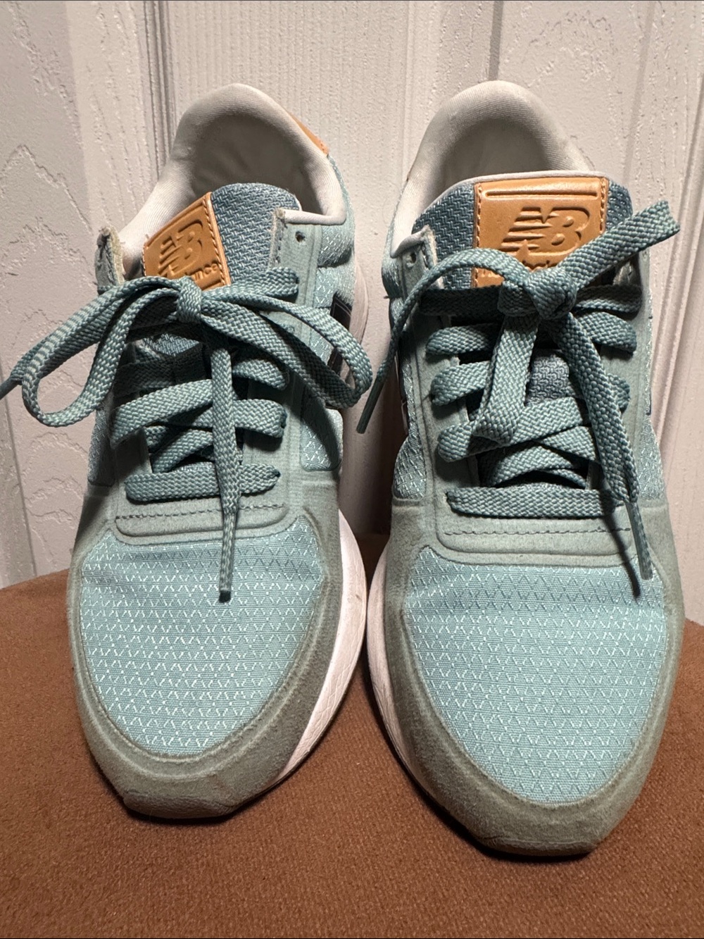 New Balance womans Mint-Blue Sneakers with Tan Logo Patch